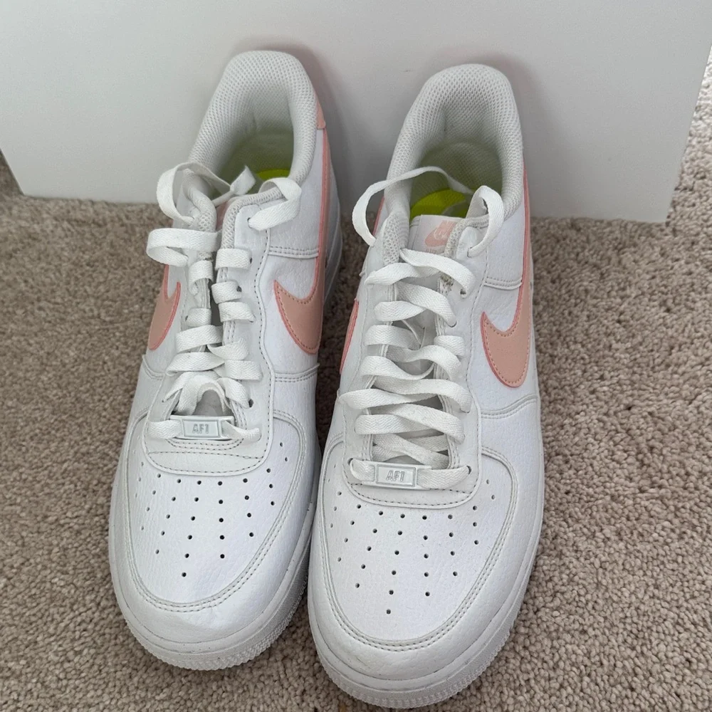 Nike White Leather Low-Top Sneakers with Pink Swoosh